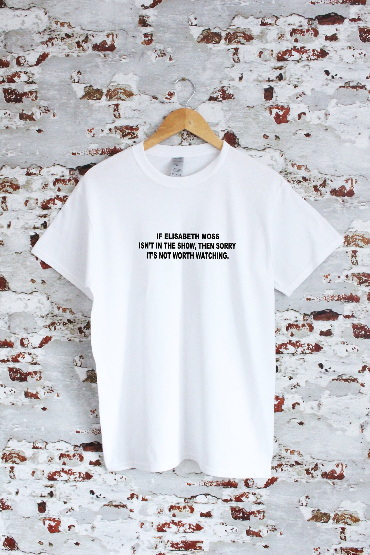 If Elisabeth Moss isn't in the show, then sorry it's not worth watching slogan printed T-shirt, multiple sizes and colours, womens top
